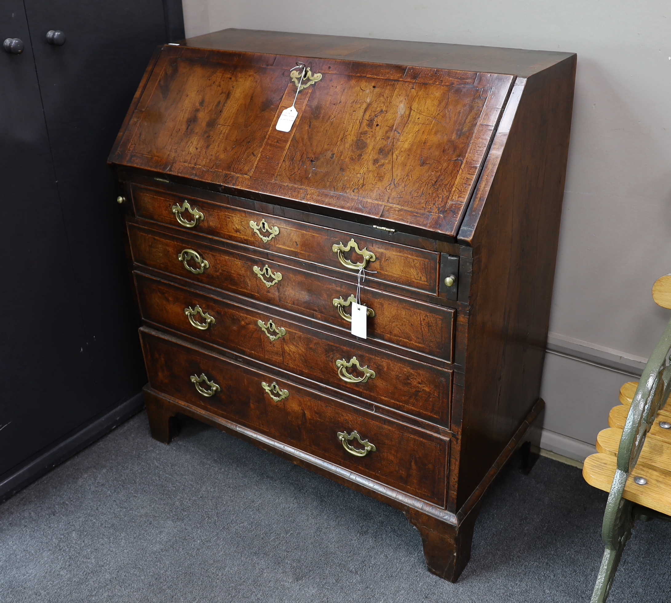 An mid 18th century banded walnut bureau, width 92cm, depth 48cm, height 104cm